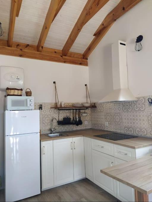 Casa De Madera El Jardin De Tara Villa Tinor Bagian luar foto
